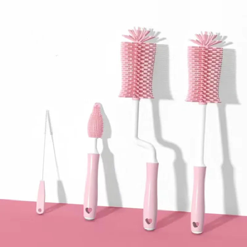 Set of three pink bottle brushes with different bristle patterns on a white background.