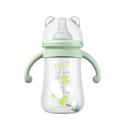 Green baby bottle with handles on a white background