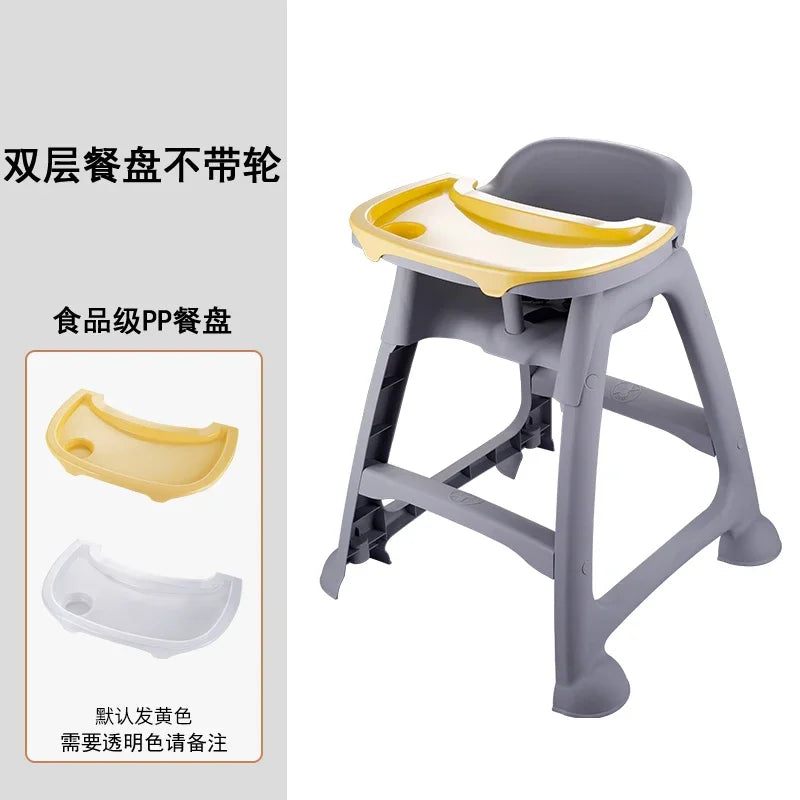 Gray baby high chair with yellow and white tray on a white background