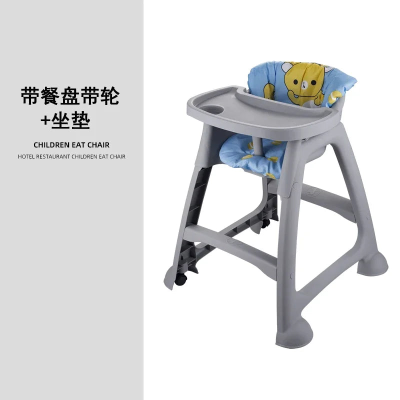 Children's high chair with a cushion featuring a cartoon bear on a white background.
