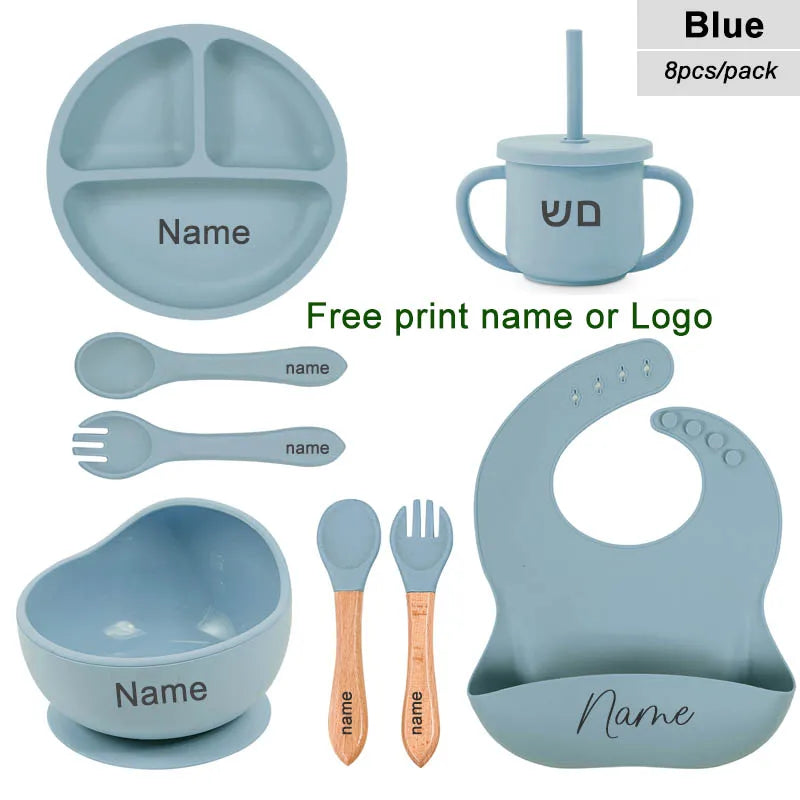 Blue children's dining set with name printing option on a white background