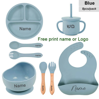 Blue children's dining set with name printing option on a white background