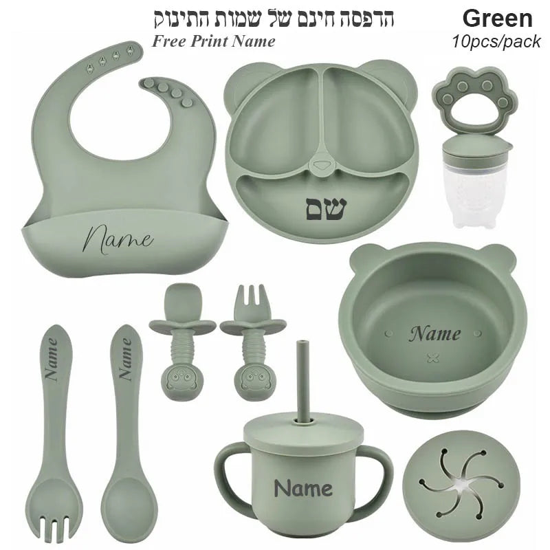 Set of green baby utensils with customizable name options on a white background