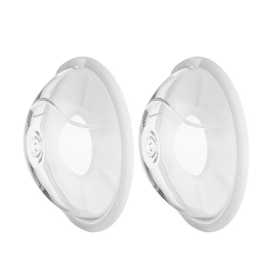 Two clear silicone breast forms on a white background