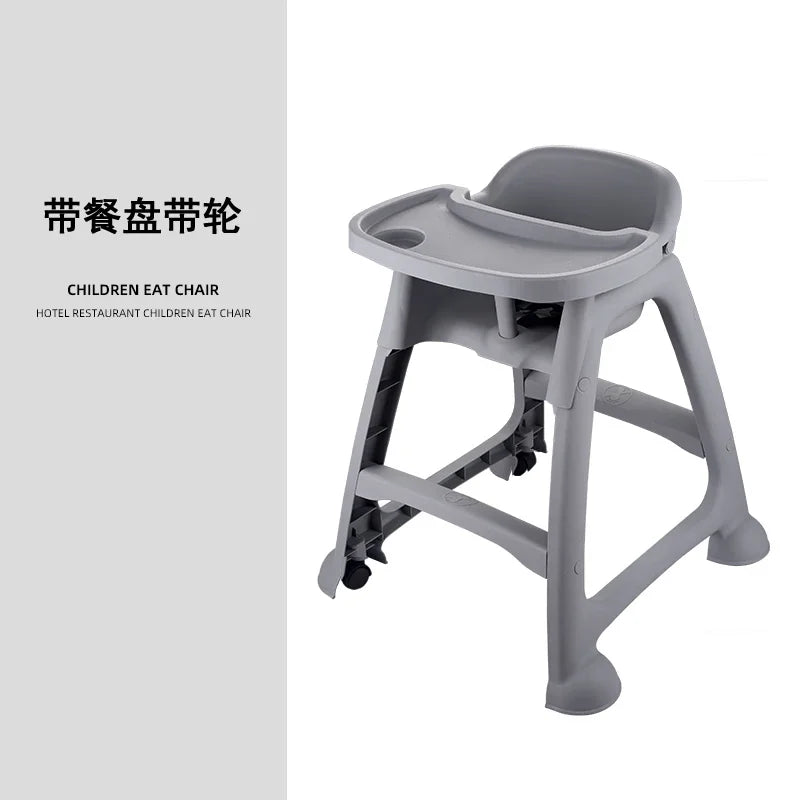 Children's eat chair with tray and wheels on a white background