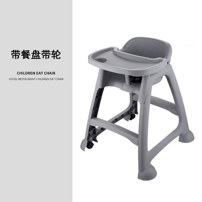 Children's eat chair with tray and wheels on a white background