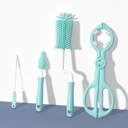 Set of four turquoise cleaning brushes on a white background