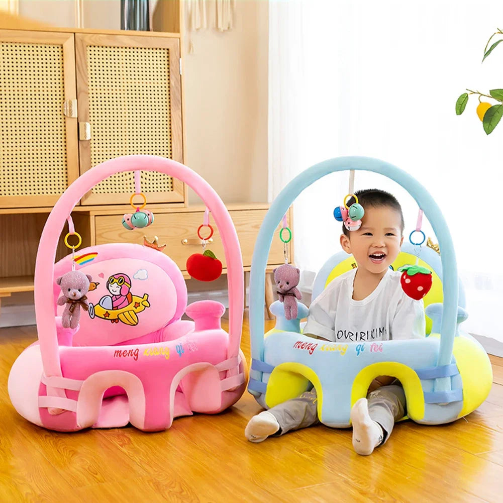 Two baby activity centers, one pink and one blue, with a child sitting inside the blue one.