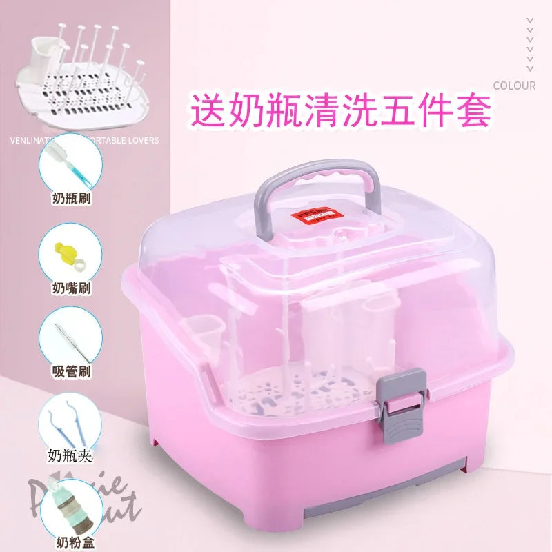 Pink storage box with cleaning tools on a light pink background
