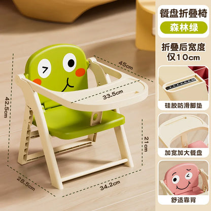 Green children's folding chair with measurements on a beige background