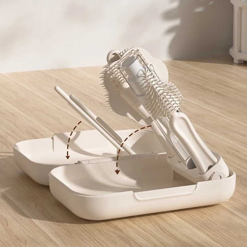 White hair styling tool set on a wooden surface