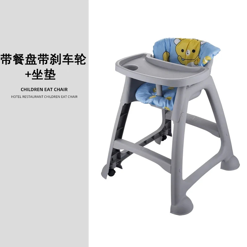 Children's high chair with a blue cushion featuring a cartoon character on a white background.