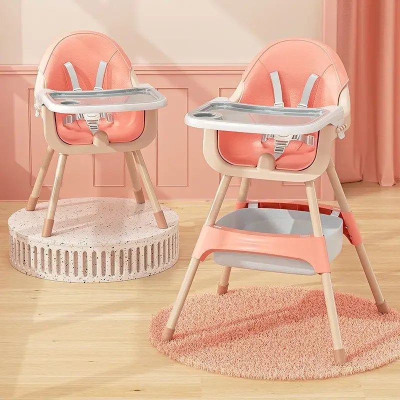 Two high chairs with pink seats and wooden frames on a light wood floor.