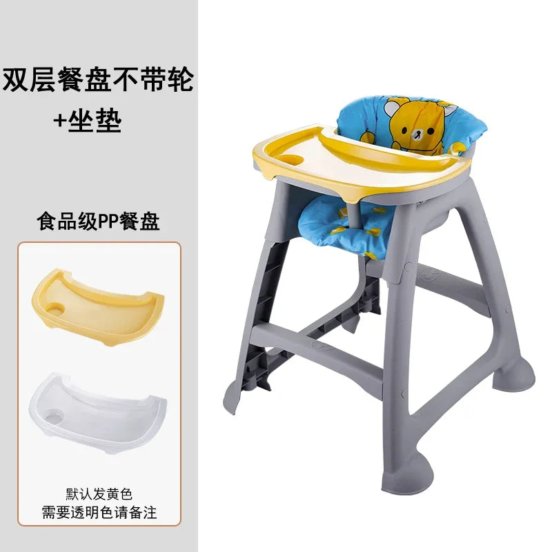 Children's high chair with bear design cushion and food tray on a white background